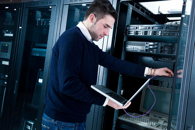 System administrator working in data center - Achieving Data Center Agility With Converged Infrastructure ...